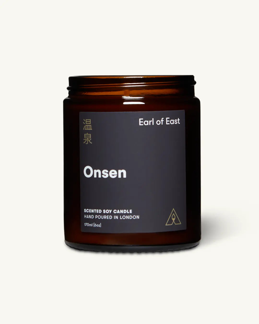 Close-up of a hand-poured soy wax candle with a clean burn and uplifting scent, inspired by Japanese hot springs.