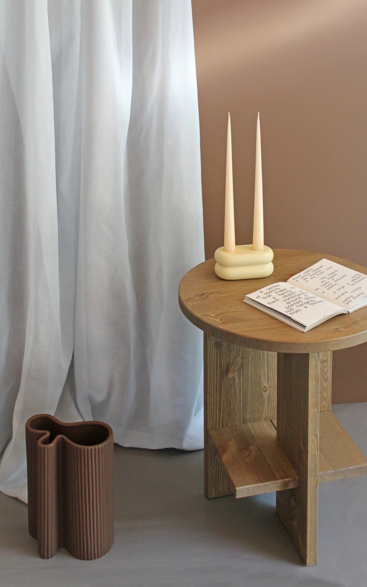 Unique handmade ceramic candlestick, 7 cm high, in soft pastel yellow for a fresh, elegant look