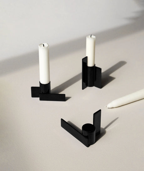 Sleek matte black Stences Icon Candlestick 02 with a geometric interlocking rectangle design, perfect for modern décor