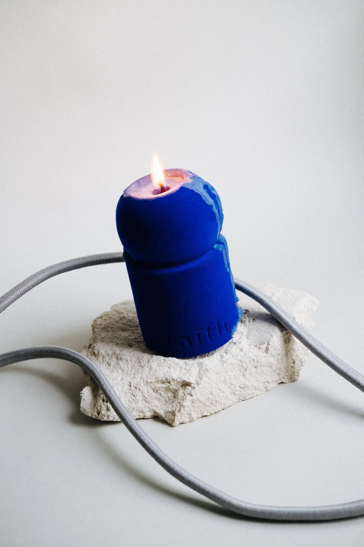 Elegant blue velvet sculpted soy candle by Taith, featuring luxurious cotton velvet and crafted from 100% soy wax for a stylish home accent.