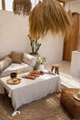 Transform your dining area with this versatile, machine washable 100% linen tablecloth in beige, perfect for modern home decor