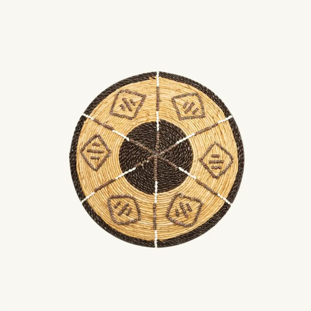 Cozumel Handwoven Wall Art crafted from natural banana leaf, featuring striking black graphic details for a bold ethnic statement