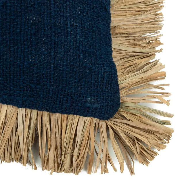 Stylish rectangular cushion cover in blue with raffia fringes, ideal for enhancing bohemian-inspired decor