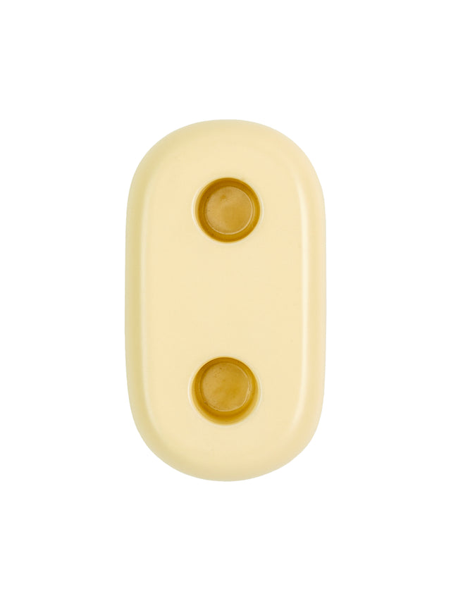 Unique handmade ceramic candlestick with a fresh yellow glaze and rounded curve design for modern spaces