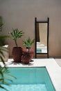 Unique large floor mirror featuring a handcrafted teak wood frame, perfect for enhancing your home décor with its natural, rustic charm.
