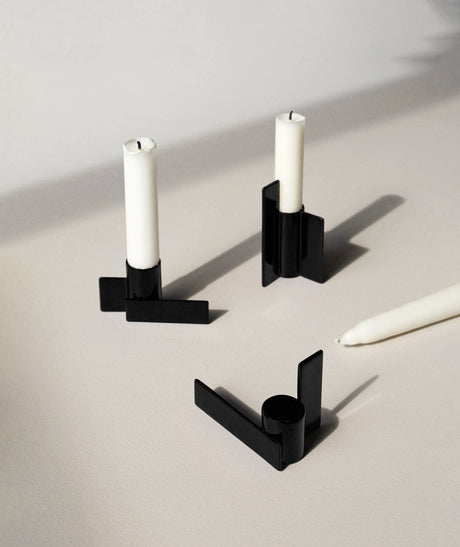 Stences Icon Candlestick 02 - Matte black graphic stainless steel candle holder with geometric design.