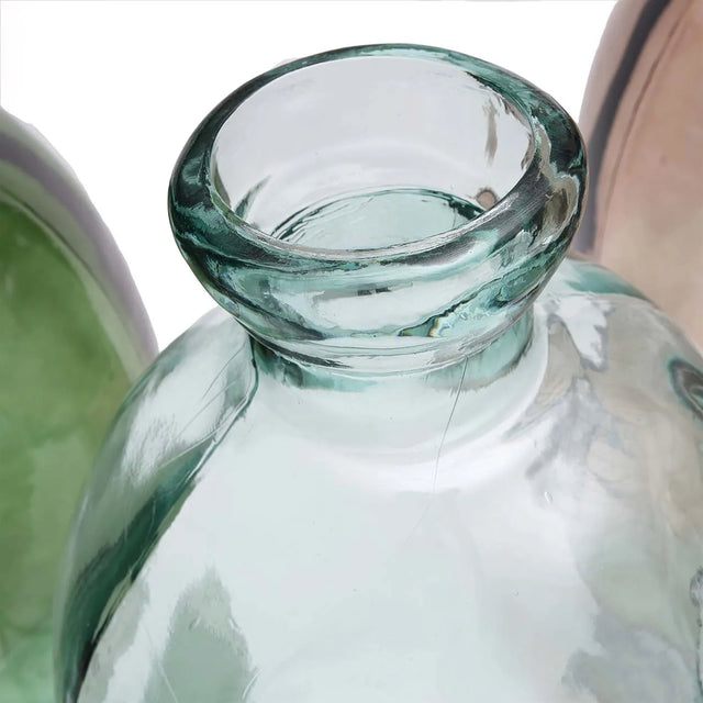 The Jinsuo Vase's striking design and smooth blue glass make it a perfect centerpiece for both indoor and covered outdoor spaces
