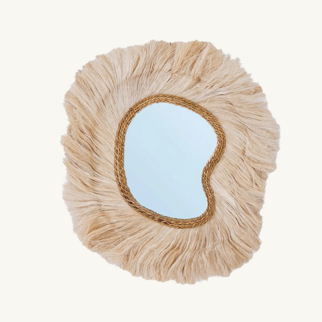 Feel like royalty with the La Principessa Mirror, featuring a gracefully curved abaca grass frame that combines regal elegance with coastal charm