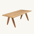 The Matita Dining Table showcasing its bold, modern legs and sleek tabletop. A statement piece for both indoor and outdoor dining settings, crafted with sustainability and durability in mind.