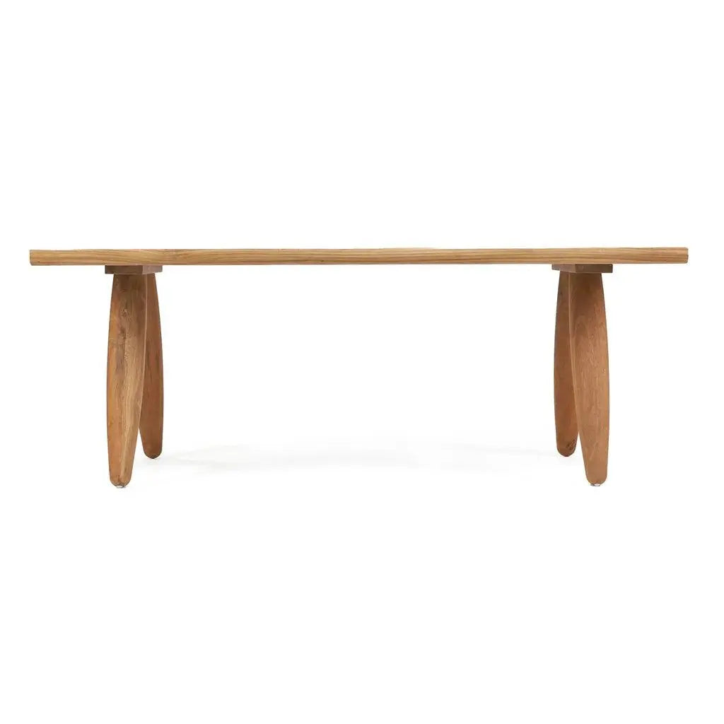 Side view of the Matita Dining Table, emphasizing its striking legs and sleek surface. Ideal for modern dining spaces, offering versatility for both indoor and outdoor use.
