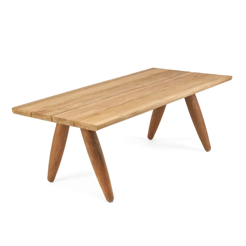The Matita Dining Table shown in both indoor and outdoor settings, demonstrating its versatility and durability. A modern, eco-friendly dining solution that makes a statement in any environment.