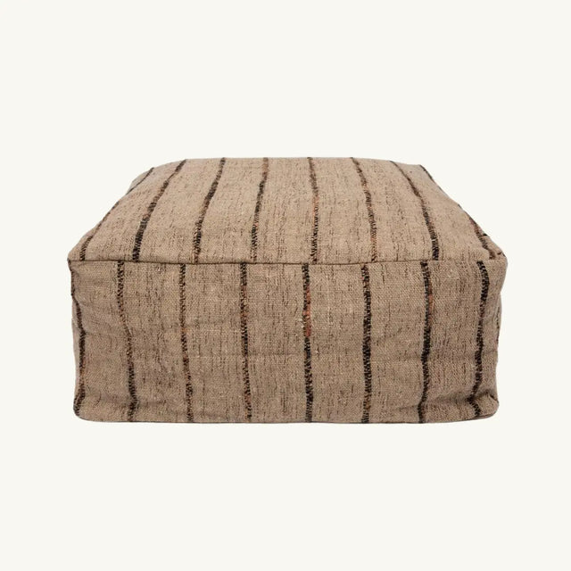 Full view of 'The Oh My Gee' Pouffe in beige and black, showcasing its bohemian design and soft cotton material.