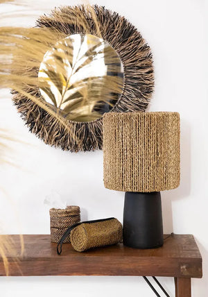 Colonial Handwoven Rattan Tissue Holder in natural brown, placed on a kitchen island for easy access