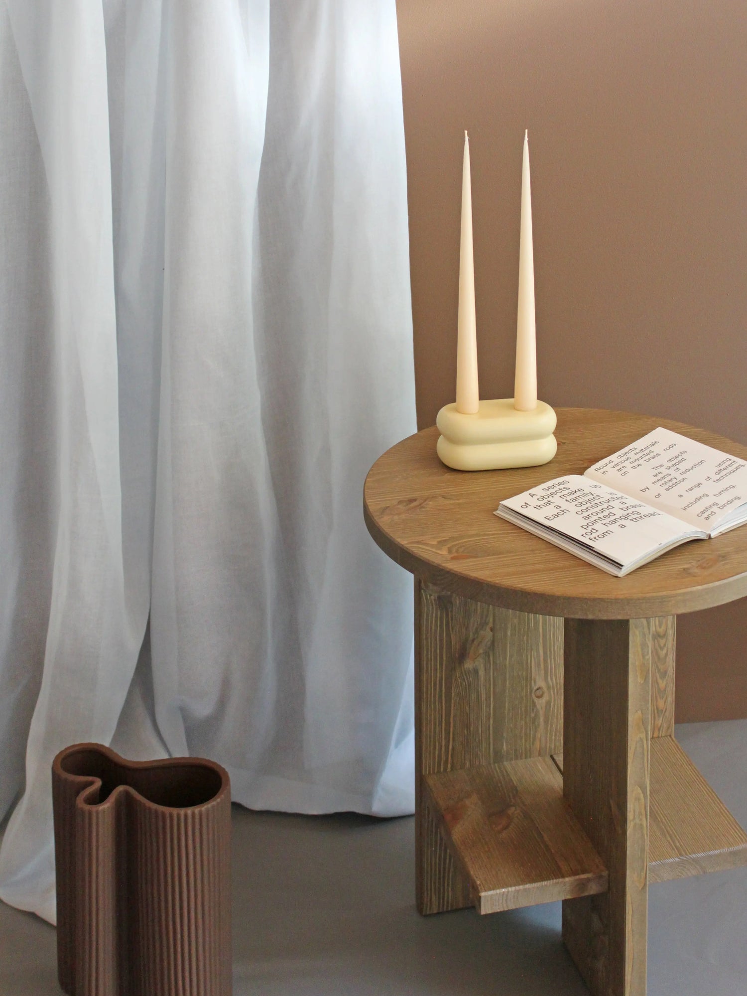 Unique handmade ceramic candlestick, 7 cm high, in soft pastel yellow for a fresh, elegant look