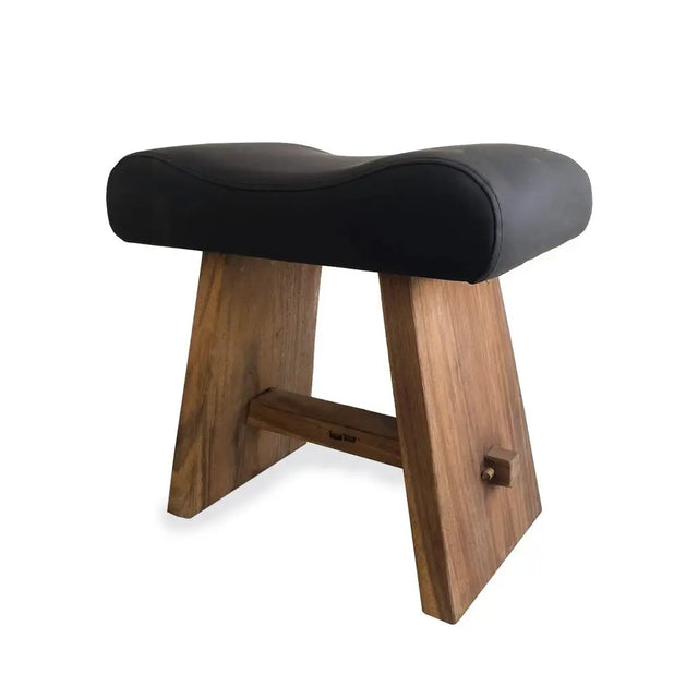 Premium suar wood stool with a natural leather seat, offering comfort and modern design for various home spaces