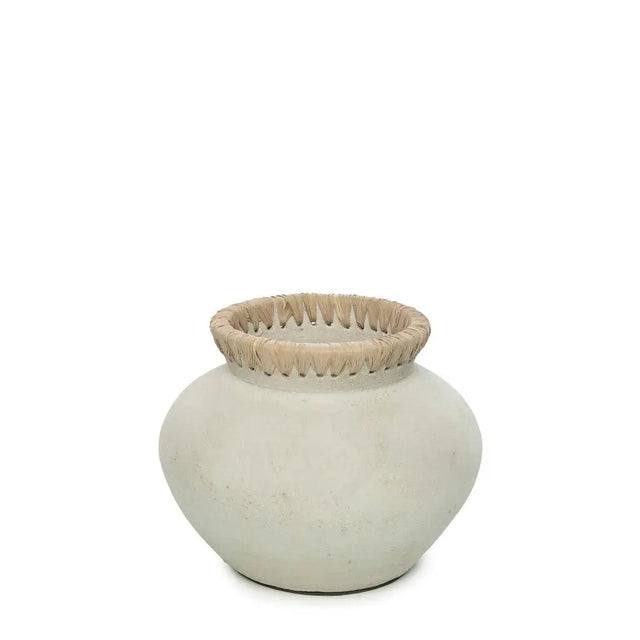 Add a coastal ambiance to your space with the 'Styly' Vase, crafted from terracotta and adorned with stylish rattan detailing