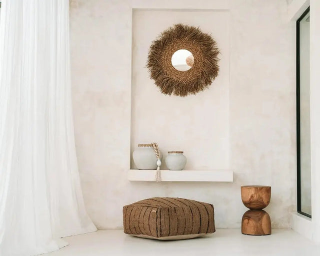 Crafted from terracotta with rattan accents, the 'Styly' Vase is perfect for creating a natural, coastal look in any room