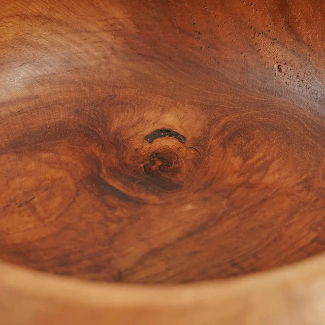 Beautifully crafted teak root fruit bowl, featuring organic, irregular shapes and rich color variations for a one-of-a-kind display.