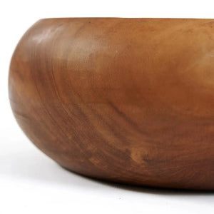 Stunning teak root fruit bowl, highlighting the natural beauty of sustainably sourced wood with its unique texture and design.