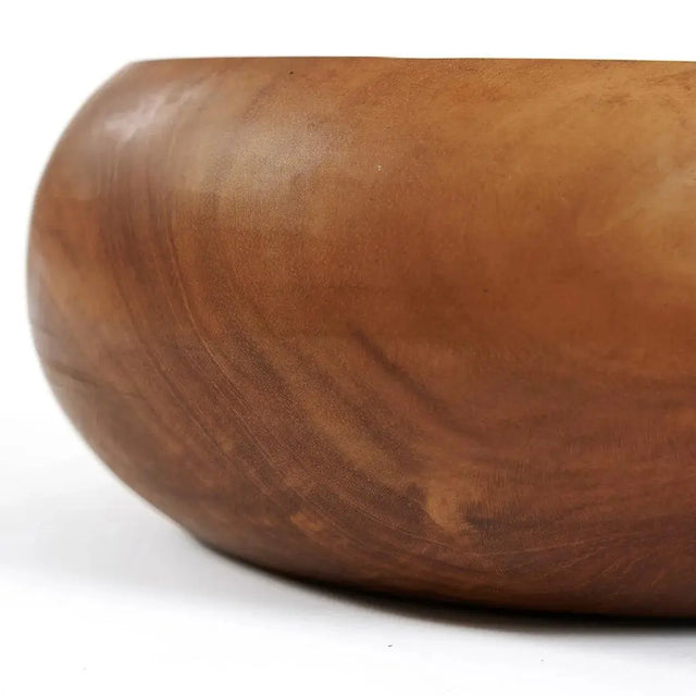 Stunning teak root fruit bowl, highlighting the natural beauty of sustainably sourced wood with its unique texture and design.