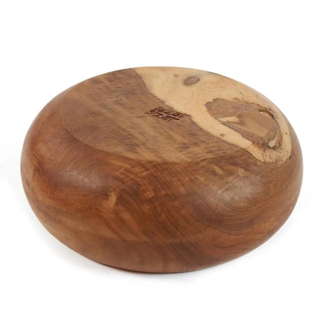 Eco-friendly fruit bowl made from teak root, designed with irregular shapes that bring a rustic, artistic touch to any home.