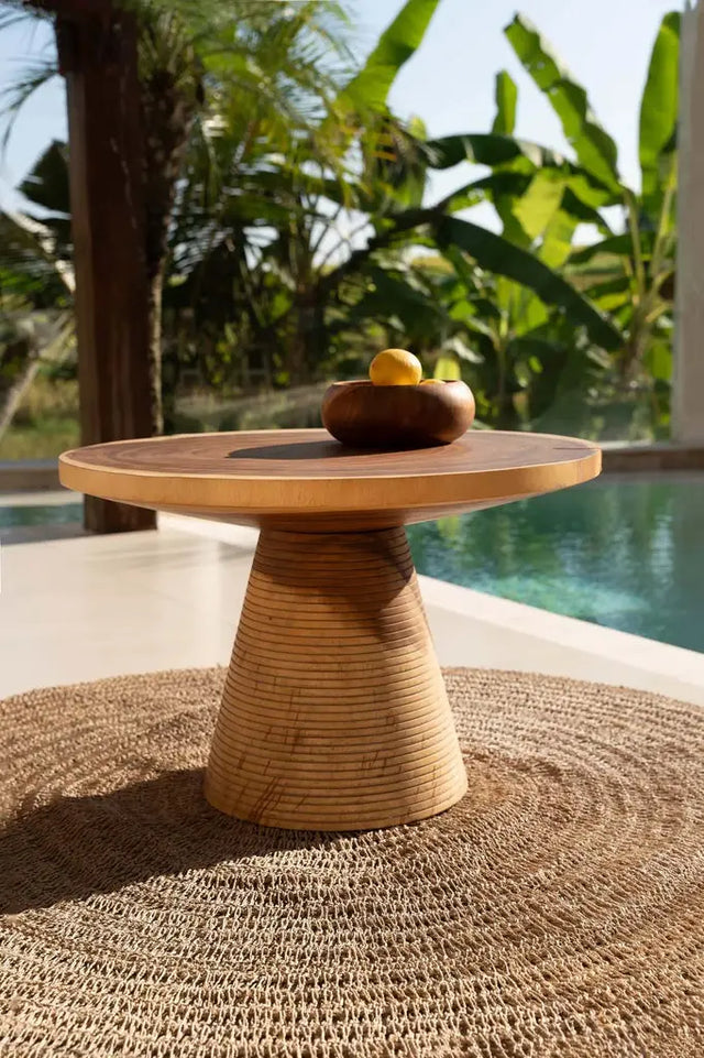 Handcrafted fruit bowl crafted from natural teak root, featuring one-of-a-kind shapes and rich wood tones that elevate your home decor.