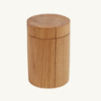 Exquisite teak wood pot, handcrafted by skilled artisans, showcasing organic contours and natural textures for a one-of-a-kind piece.