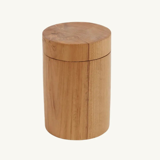 Exquisite teak wood pot, handcrafted by skilled artisans, showcasing organic contours and natural textures for a one-of-a-kind piece.