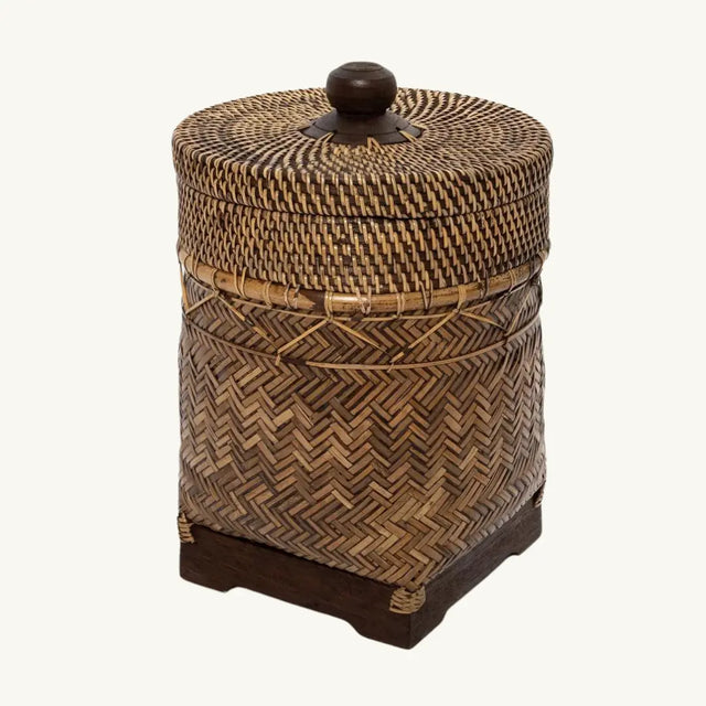 This charming handwoven rattan basket in natural brown adds rustic charm to any space. Perfect for storage or as a bathroom caddy, bringing Oriental allure to your decor.