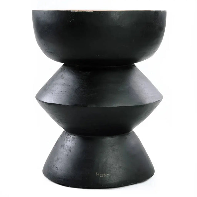 Make a statement with the Kulun Stool. Crafted from high-quality Suar wood, its modern black finish brings a touch of sophistication to any room.