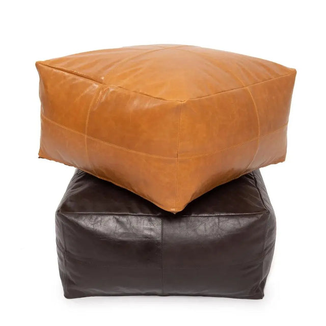 Comfortable chocolate leather pouffe with a bohemian touch, perfect for relaxing and adding a stylish accent to your home decor.
