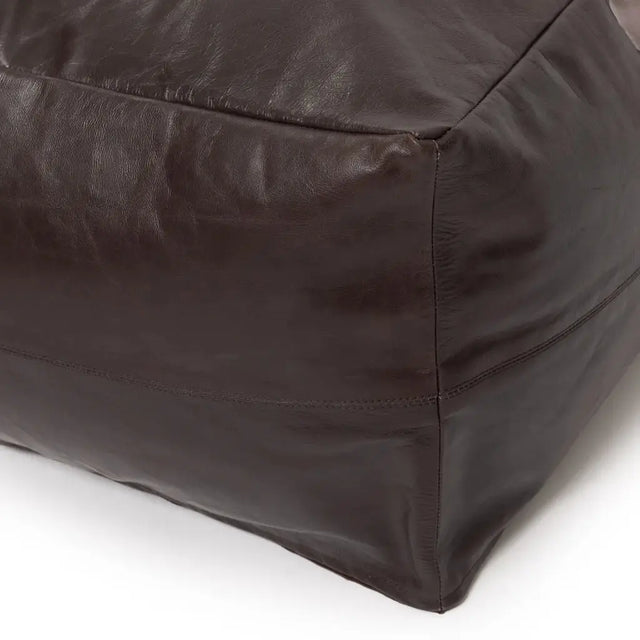 Rich chocolate nappa leather pouffe, designed to bring luxurious comfort and bohemian style to any room in your home.