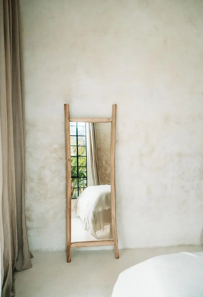 Elegant large floor mirror framed in natural teak branches, perfect for creating a stylish statement in your home décor.