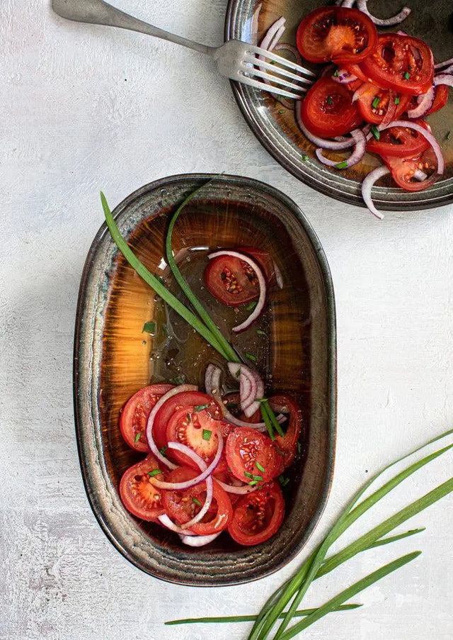 Discover the beauty of Portuguese ceramics with the Comporta Collection, featuring a craquelure glaze and unique color variations. Perfect for any dining occasion.