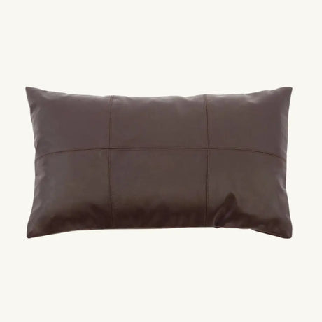 Add a refined touch to your living space with this luxurious chocolate brown leather cushion. Crafted with soft calfskin leather and a suede-textured backing, perfect for modern or rustic interiors.