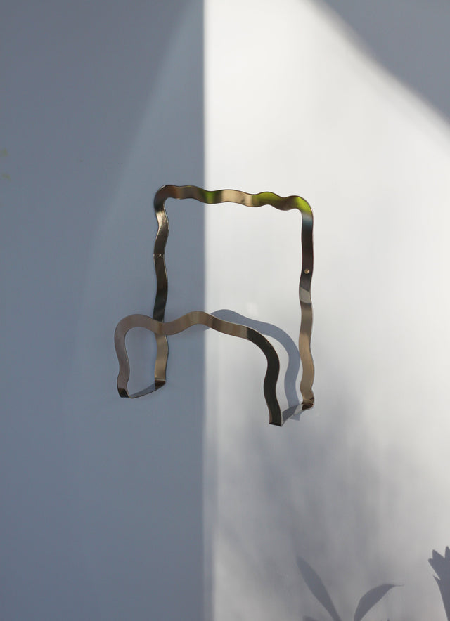 Wall-Mounted Magazine Holder - Glossy Chrome with Artistic Wave Design by Stences Stences