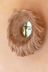 Close-up of the Abaca Round Mirror's natural grass-wrapped frame, showcasing its earthy and eco-friendly texture.