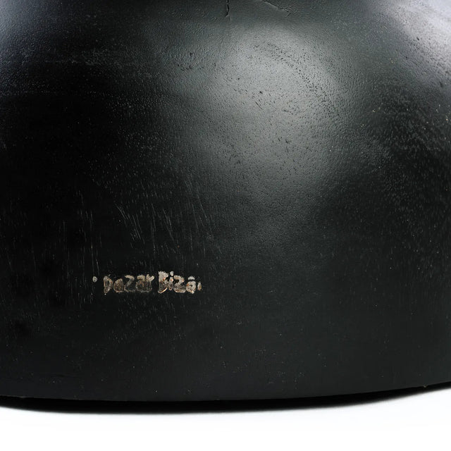 The organic, round shape of the Carbon Crow Stool adds a natural and stylish element to any room