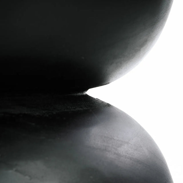 Carbon Crow Stool used as additional seating, offering both style and function in any interior.