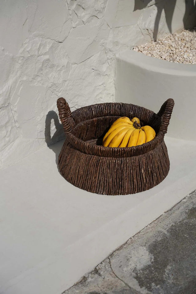 Chizara Mand Basket styled with decorative items, adding natural charm and texture to the decor