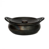 Black Burnt Terracotta Serving Pot with Lid, elegant oval design, food-safe and dishwasher-safe, perfect for refined table settings.