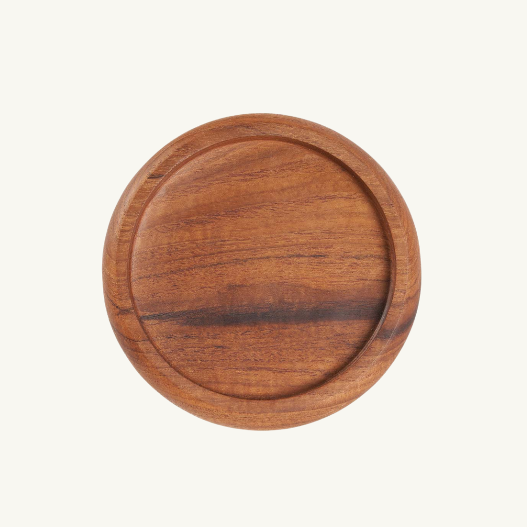 Elegant Teak Wood Coaster with a natural finish, perfect for protecting surfaces while enhancing home decor.