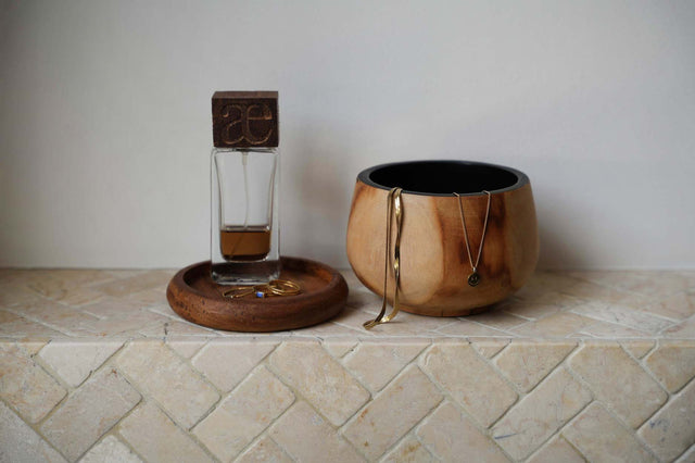 Elegant Teak Wood Coaster, ideal for protecting surfaces from water rings and stains while adding sophistication.