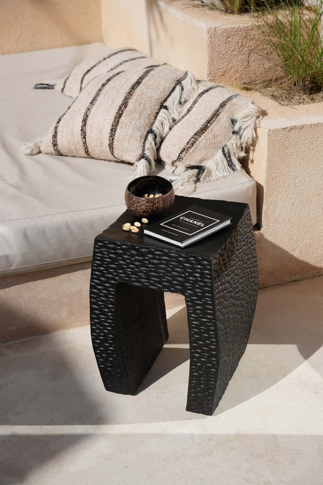 Montano Stool in black suar wood, featuring a sturdy and elegant design