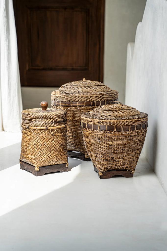 Colonial Rattan Laundry Basket repurposed as a storage solution, styled with blankets in a modern living room