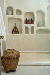 Colonial Rattan Laundry Basket used as a versatile decor piece, storing household essentials elegantly.